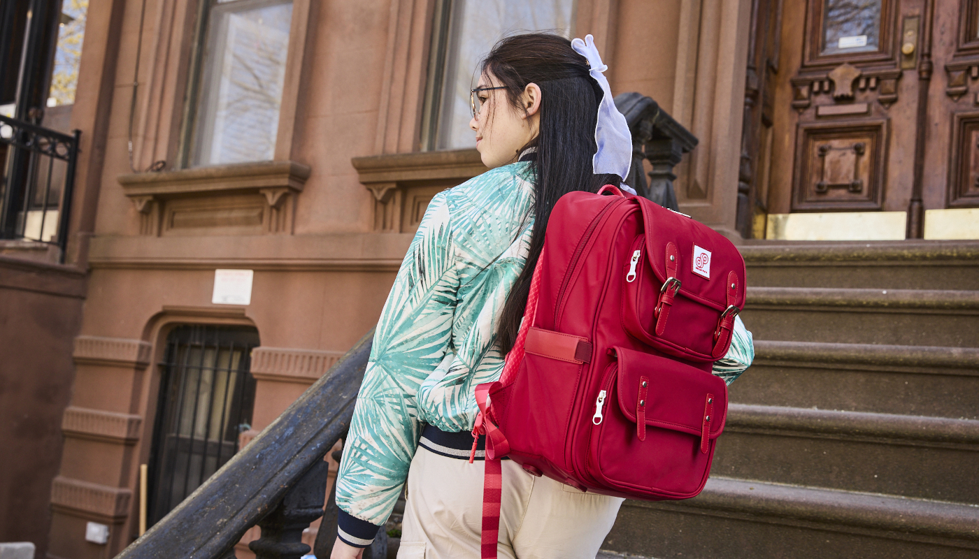 child with ergonomic backpack good posture